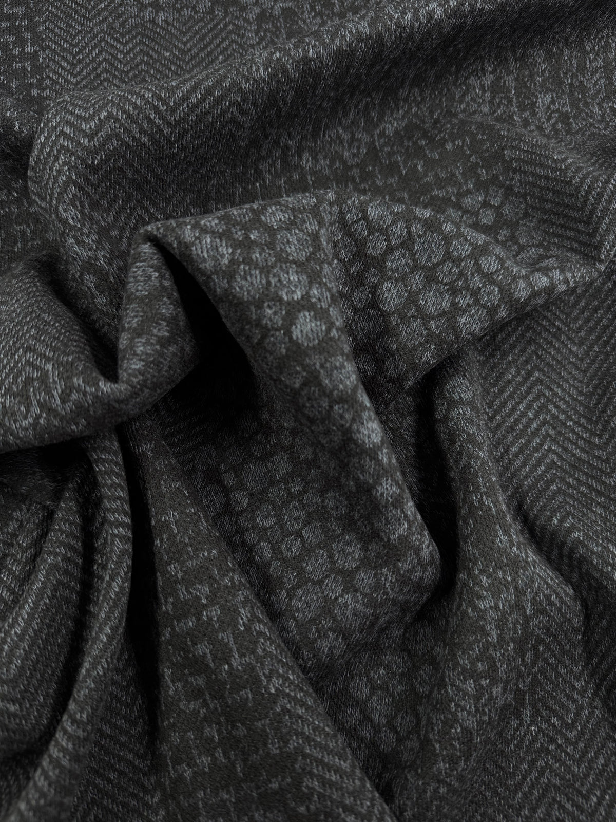 Stone Mosaic textured knit fabric close up