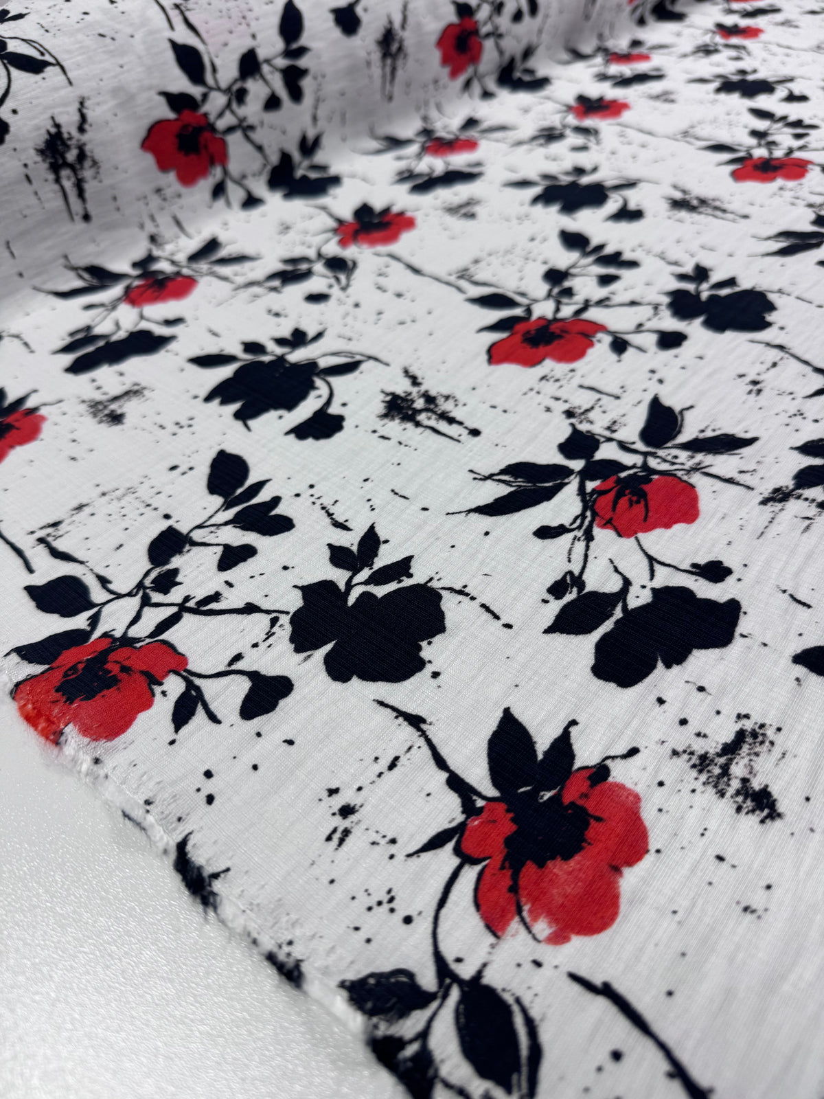 Ink Floral printed linen blend fabric draped view