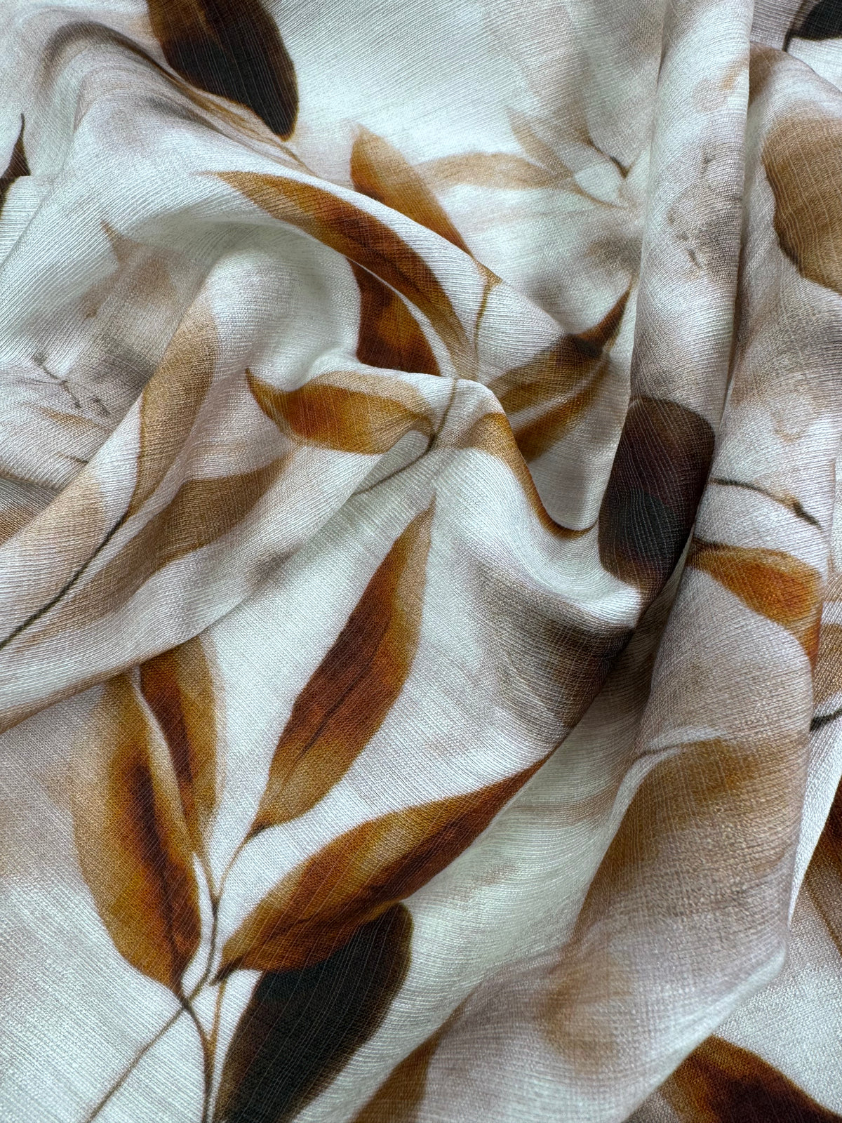 Mocha Leaves printed linen blend fabric close up