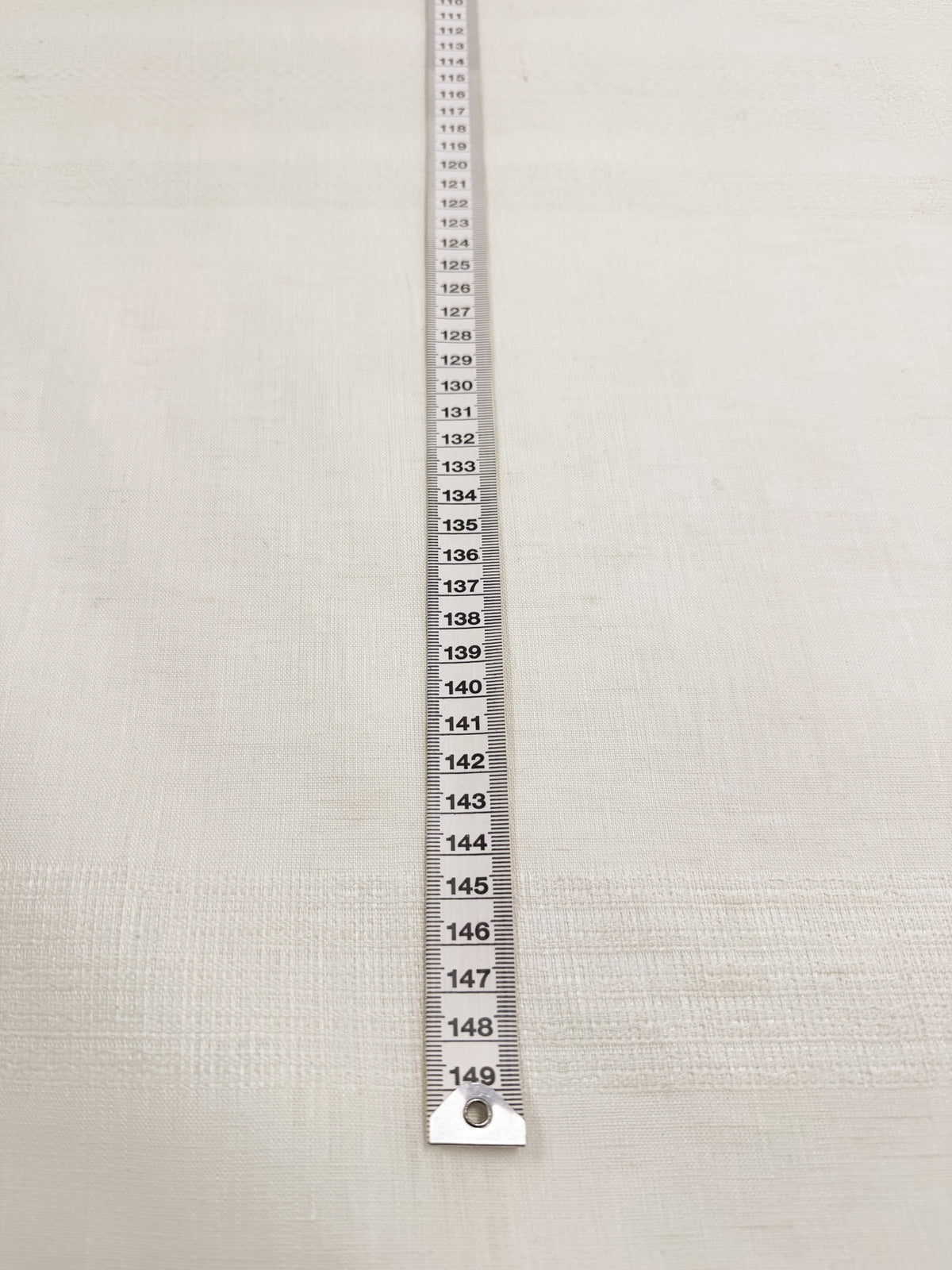 Cream linen draped to show its natural fall