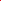 A close-up of Super Cheap Fabrics' Lining - Red - 150cm shows vibrant red fabric gathered in soft folds with a swirl pattern, silky sheen, and emerald green polyester lining that highlights its smooth, glossy surface.