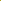 A close-up of Super Cheap Fabrics' Microfibre Suiting - Mango Mint (150cm) shows bright yellow fabric with soft folds and gentle draping, giving it a smooth texture with a slightly wrinkled look.