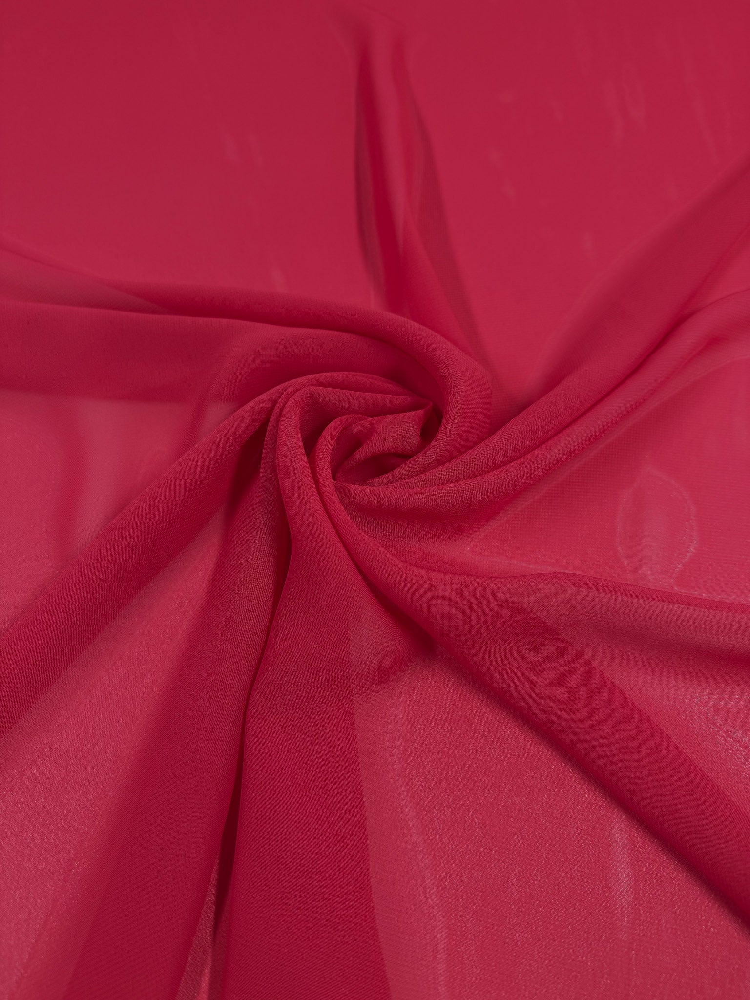 Hi-Multi Chiffon - Lollipop by Super Cheap Fabrics features sheer red fabric arranged in soft folds and gentle, flowing swirls. Lightweight and 150cm wide, it adds a delicate texture to any project.