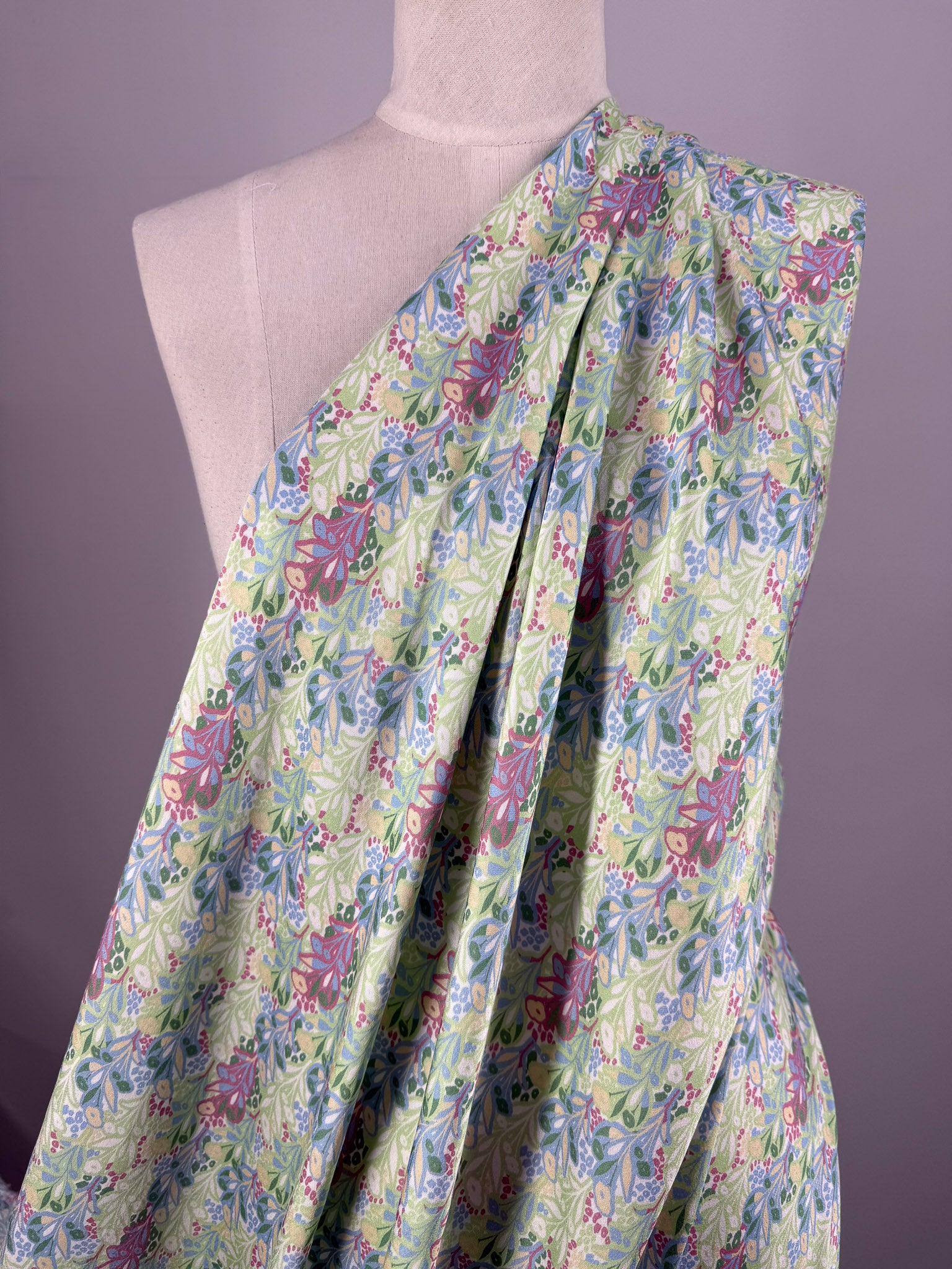 A dress form features 